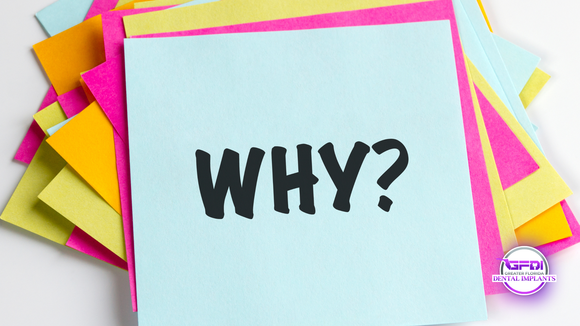 Pile of sticky notes, central one reads