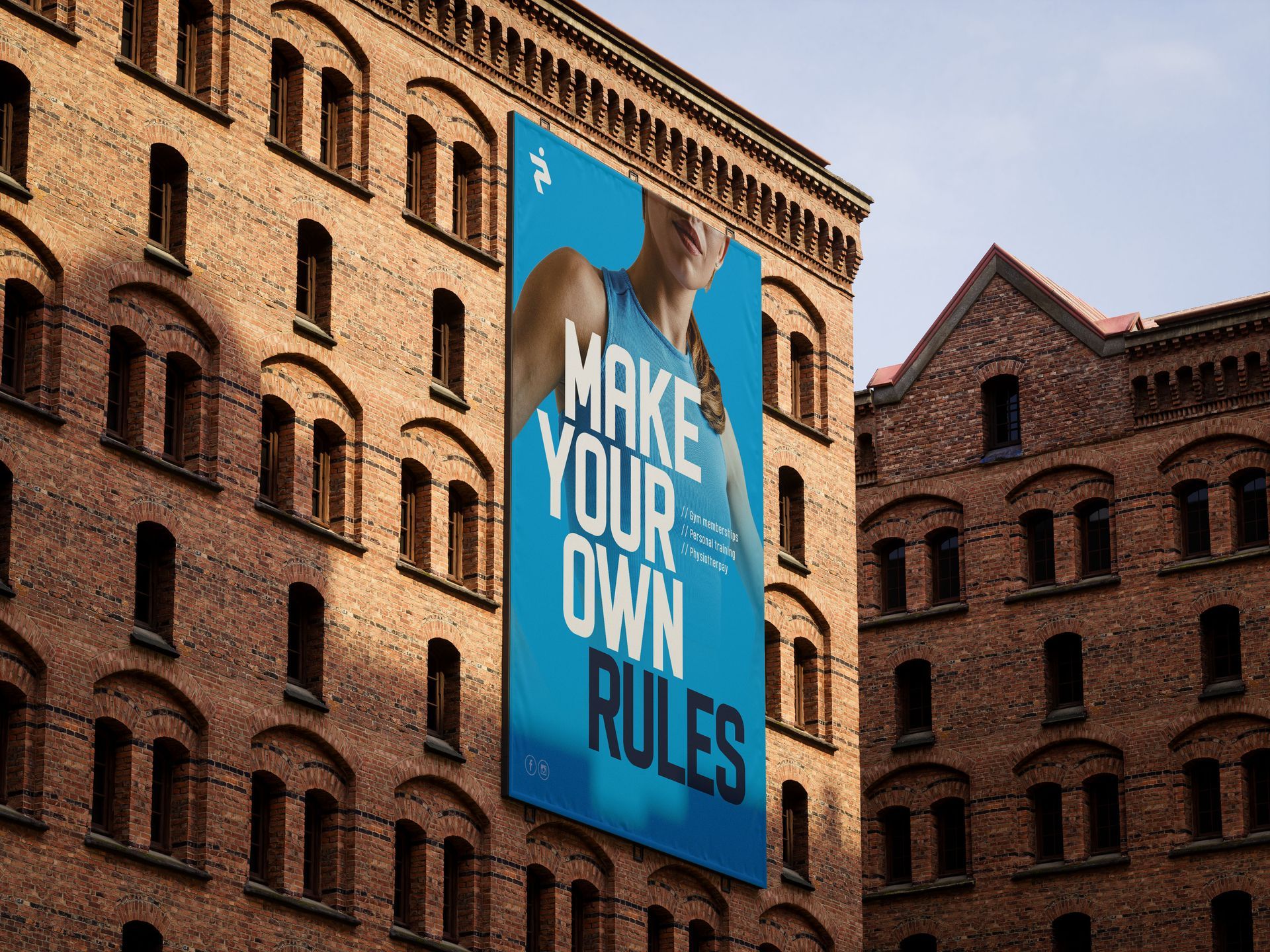 a large blue sign on the side of a building says make your own rules