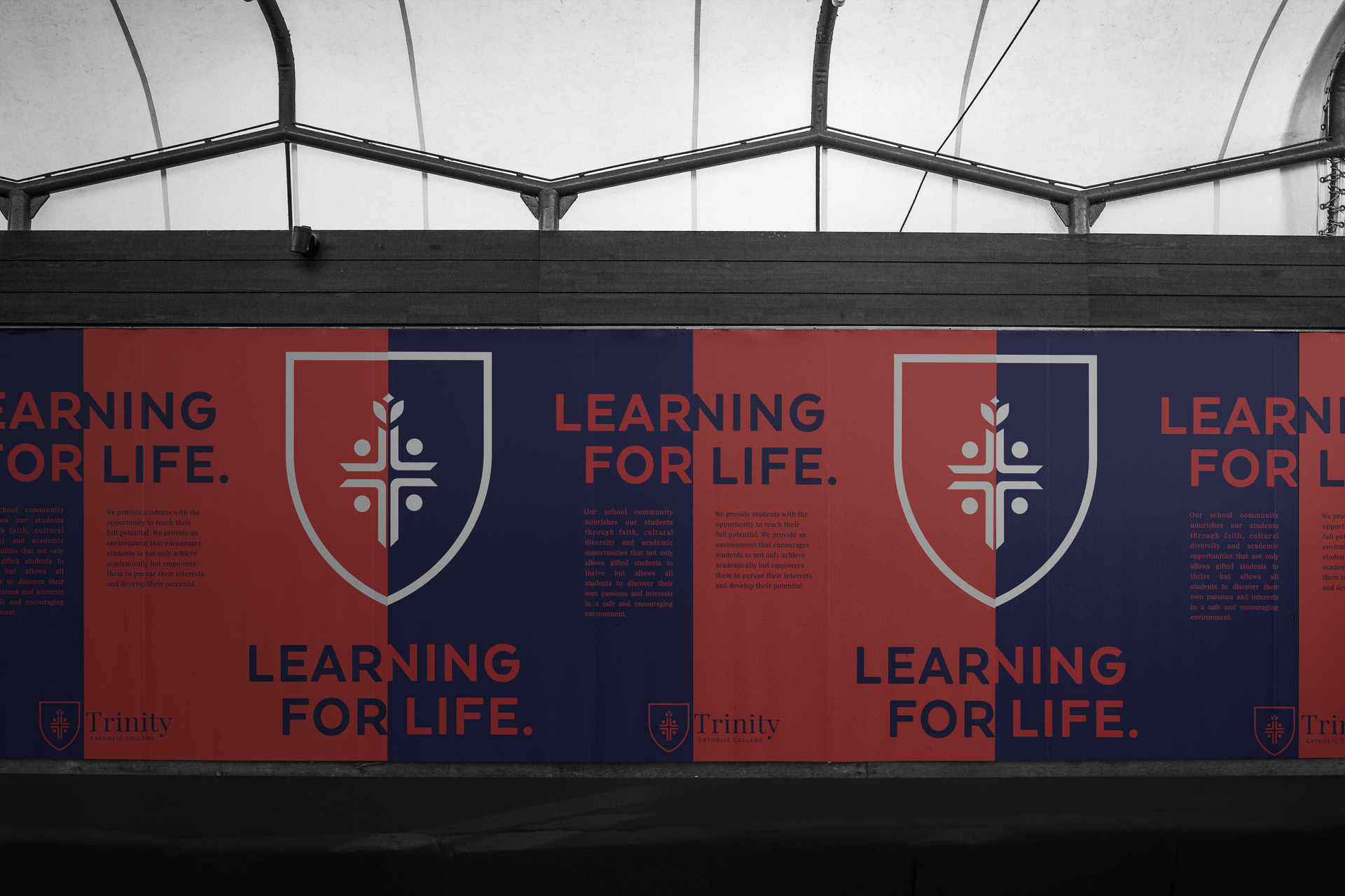 a red and blue sign that says learning for life