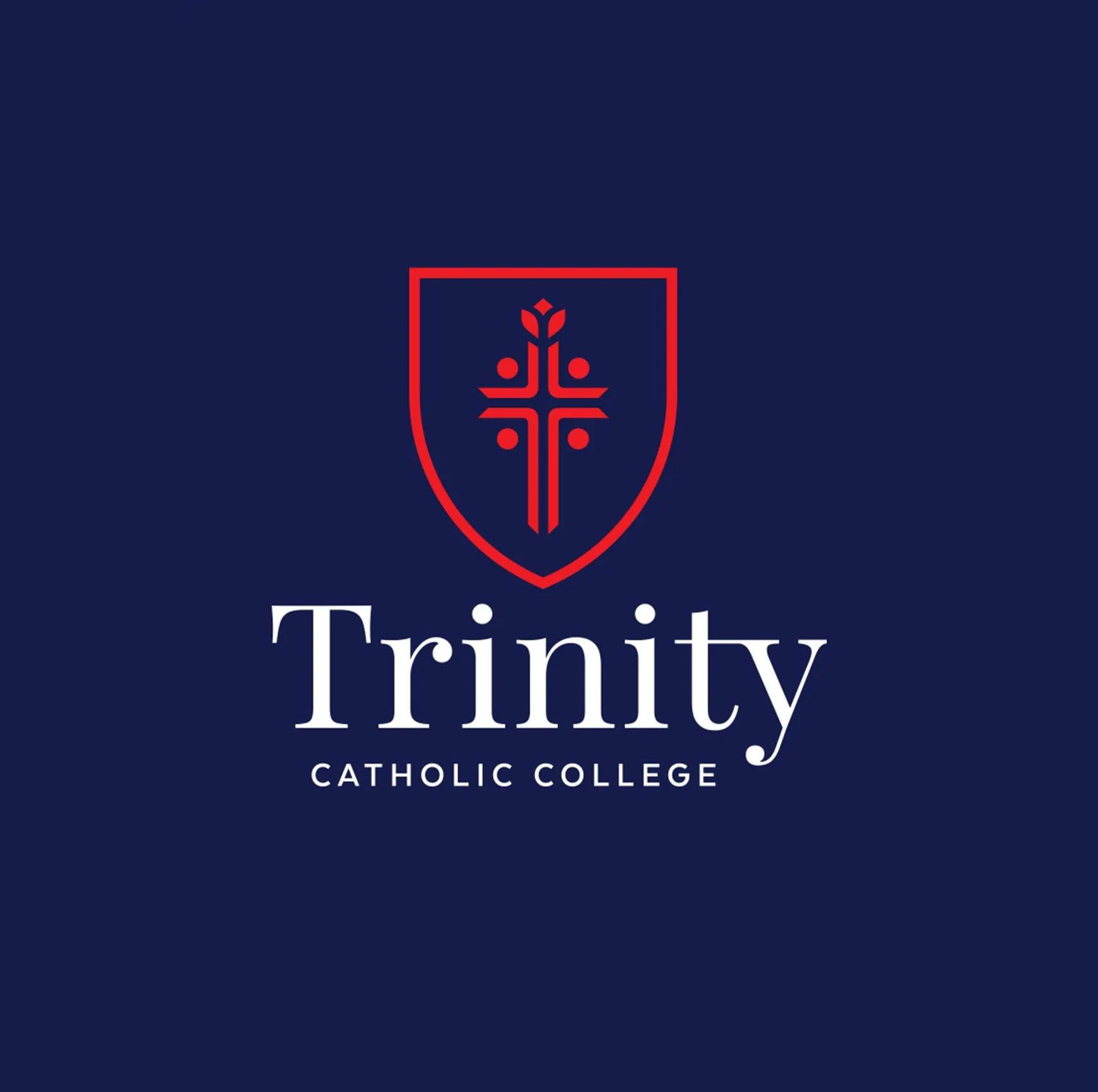 A logo for trinity catholic college with a cross on a shield