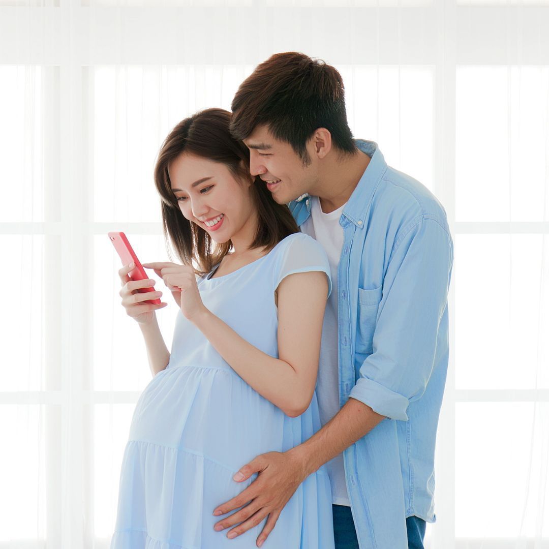 Man and Pregnant Woman