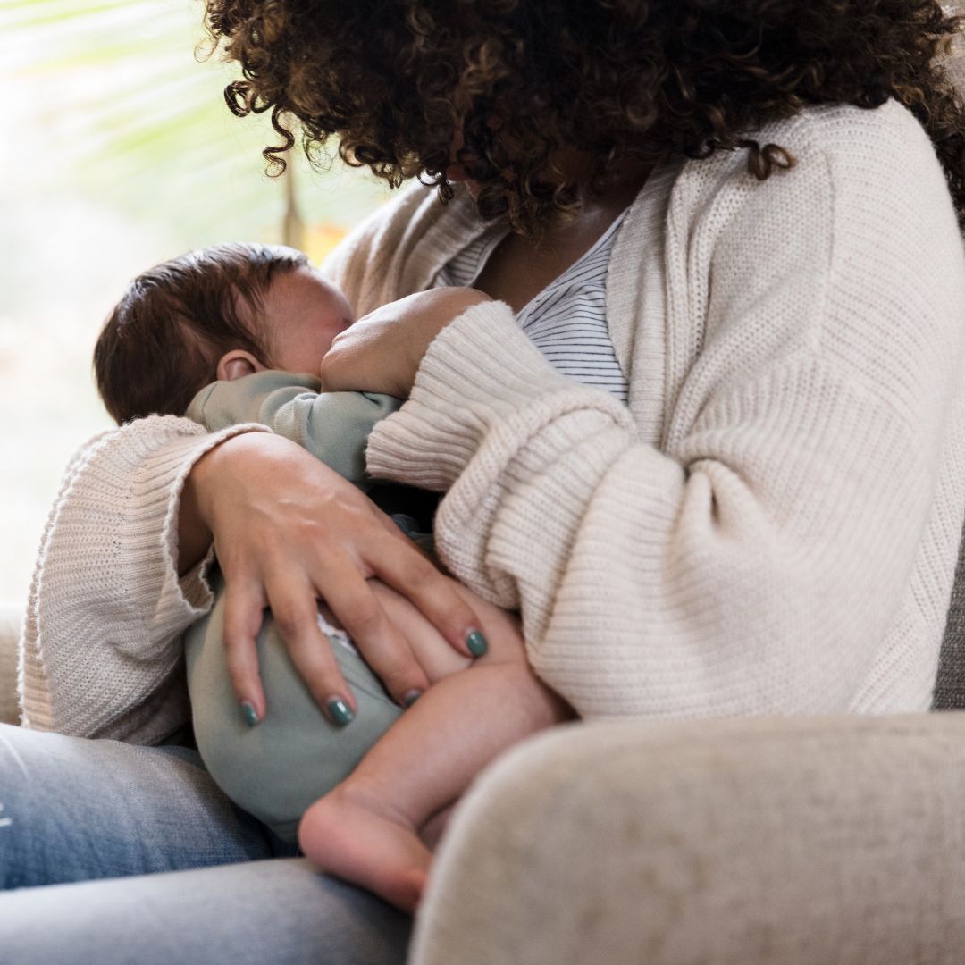 Mom Nursing Child