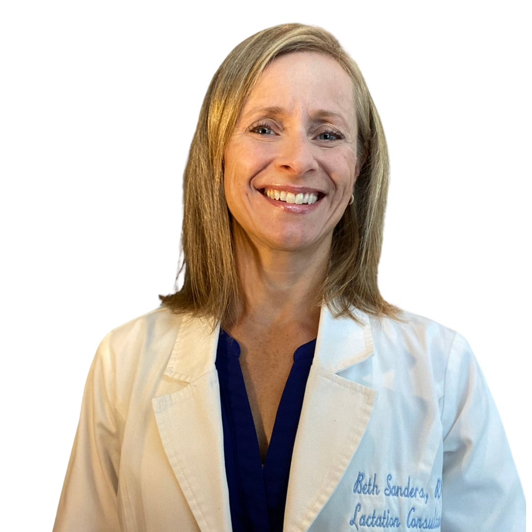 A woman in a lab coat is smiling for the camera