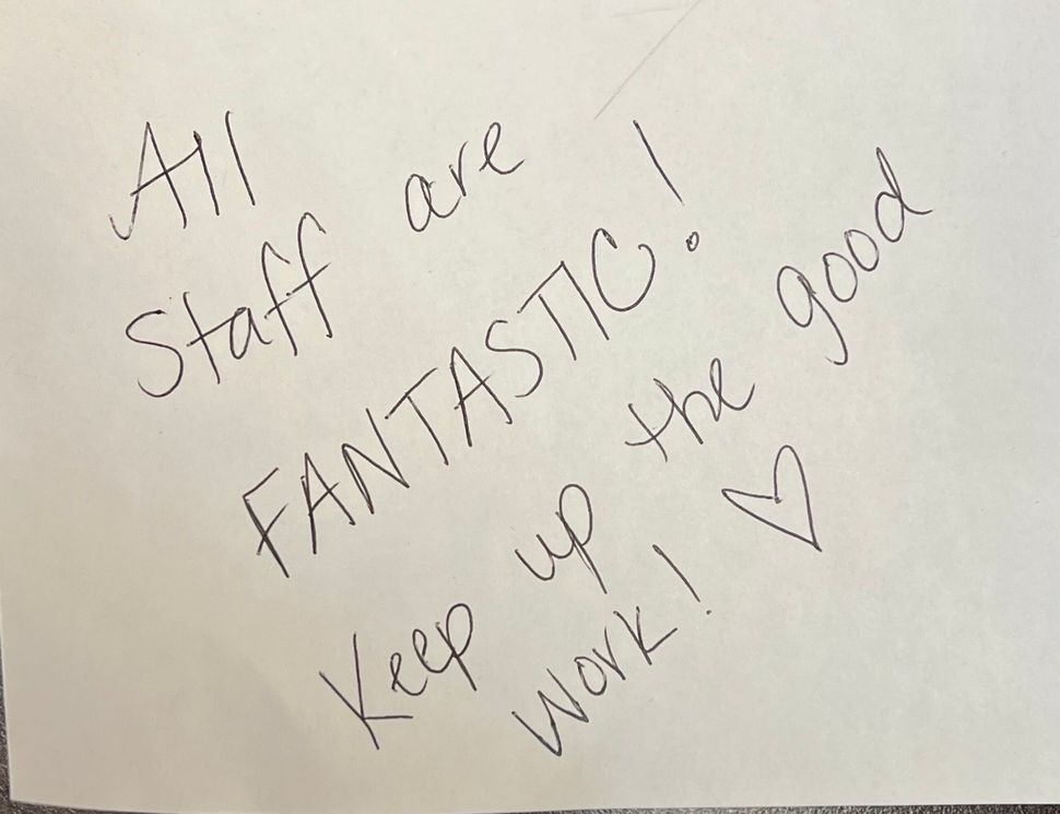 A note that says all staff are fantastic keep up the good work