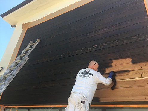 Man Painting the Door — Commercial Painter in Chatsworth, CA