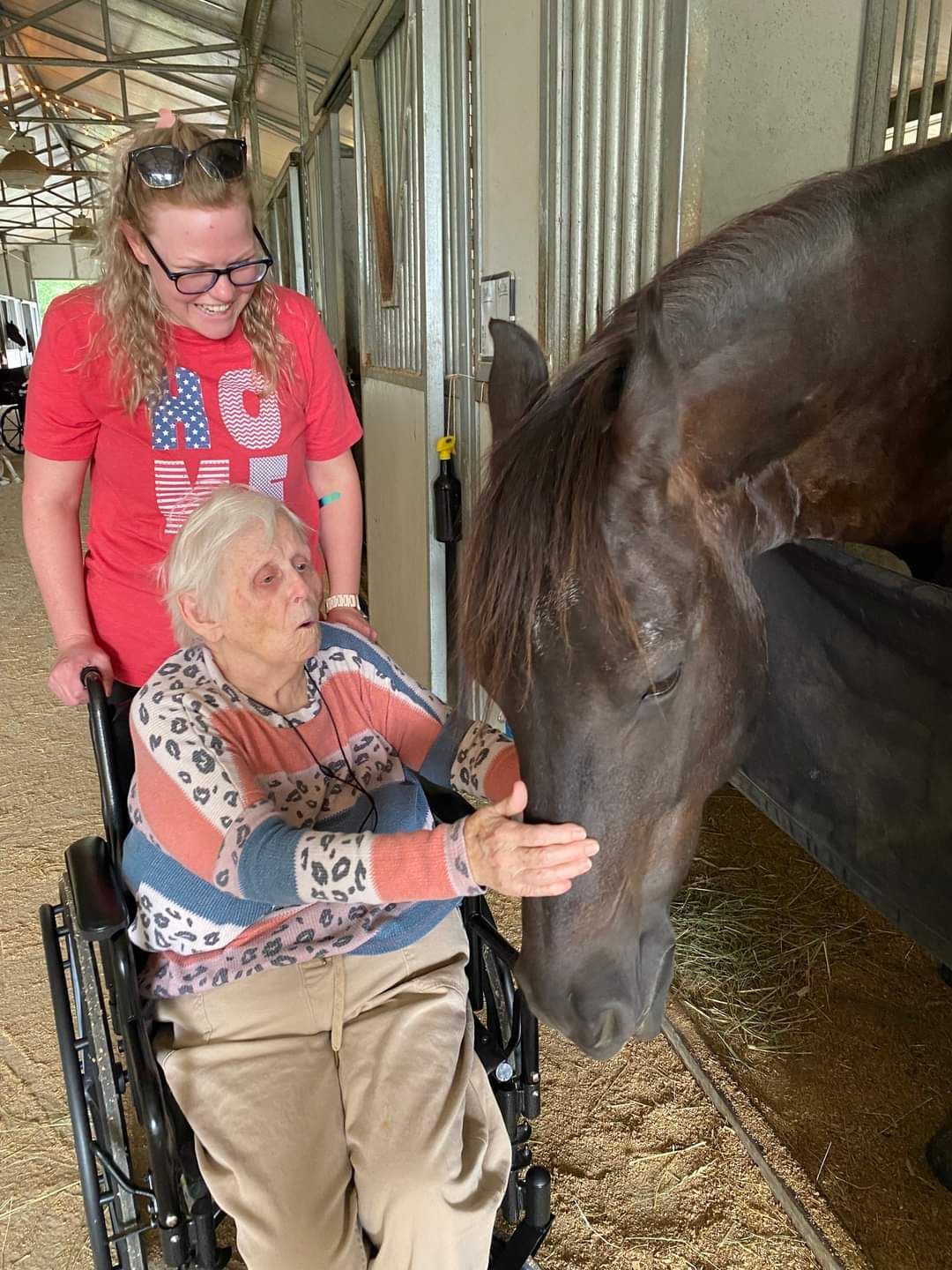 A horse in a stable with smoke coming out of its nose