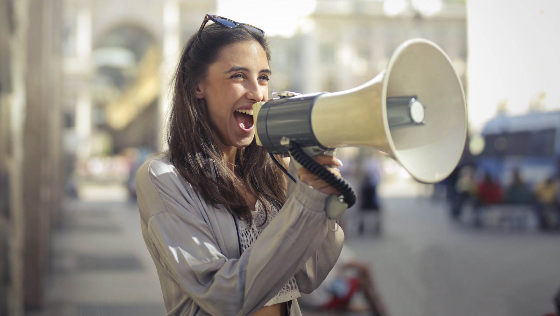 Lady yelling in megaphone, 