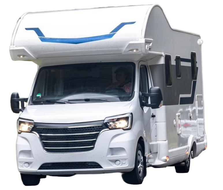 White RV with blue accents on a road. Driver visible inside.