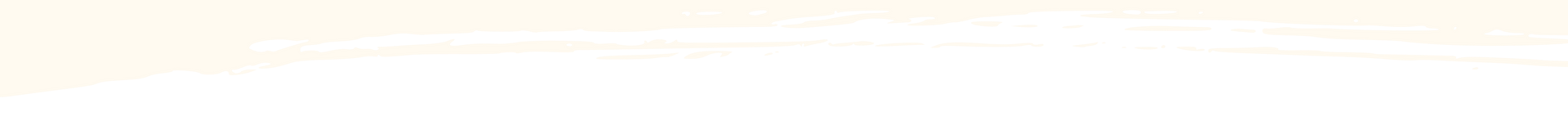 Blurred off-white background with hints of light peach.