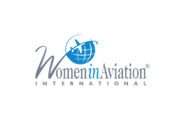 The logo for women in aviation international has a globe and an airplane on it.