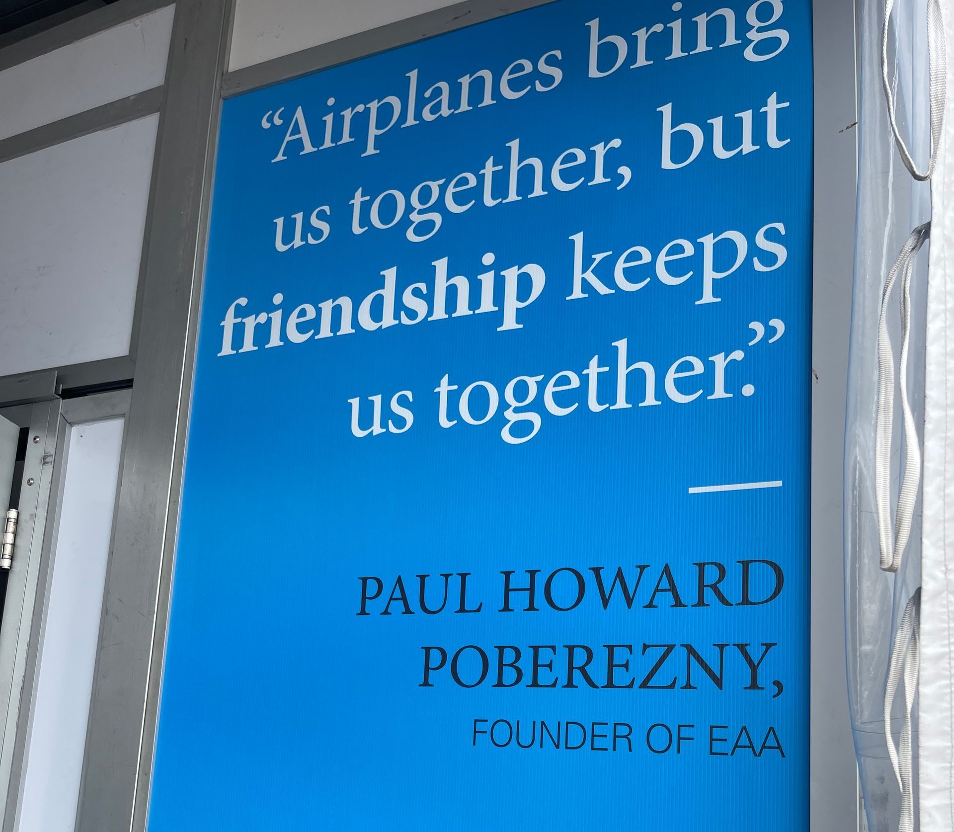 A blue sign that says 