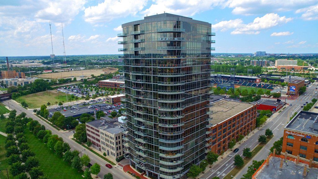 An aerial view of a tall building in a city