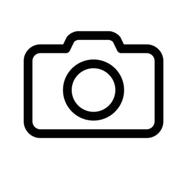 A black and white icon of a camera with a circle in the middle.