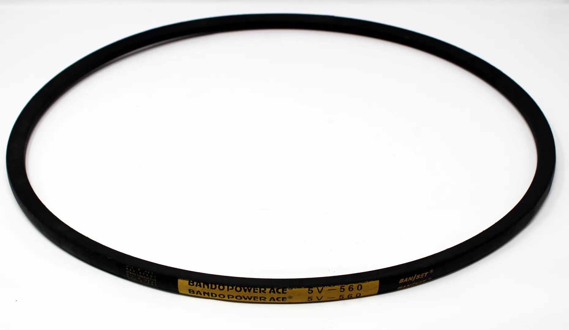 Black circular rubber V-belt. Contains printed text in gold.
