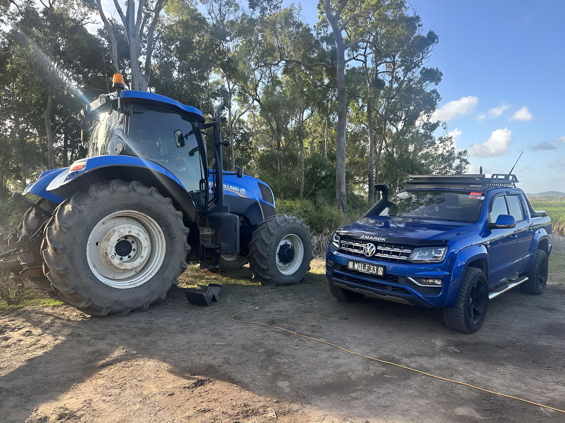 Blue Tractor and Blue SUV — Dieselflash Whitsundays in Airlie Beach, QLD