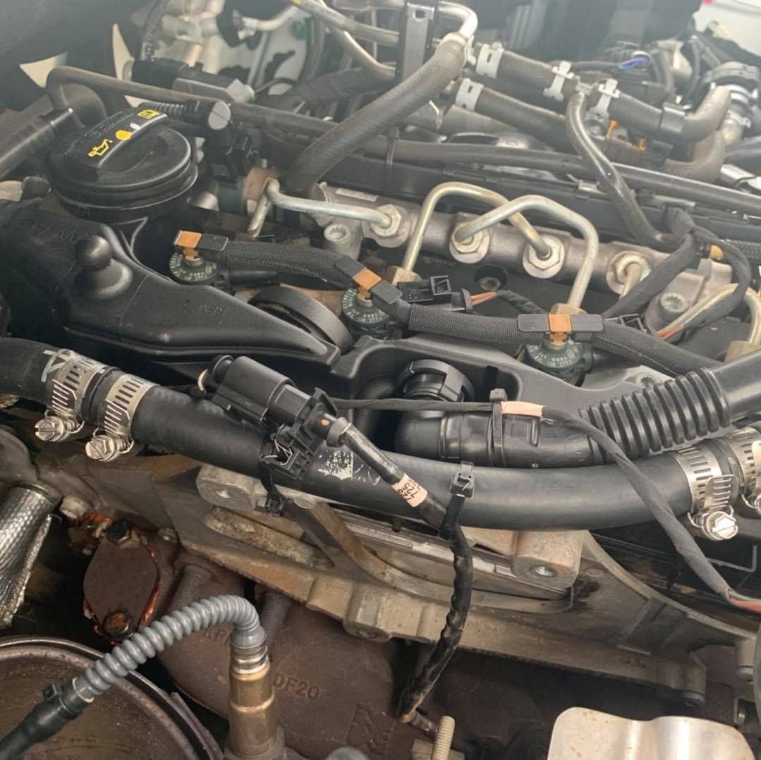 A Close Up Of A Car Engine With A Lot Of Wires Coming Out Of It — Dieselflash Whitsundays in Proserpine, QLD