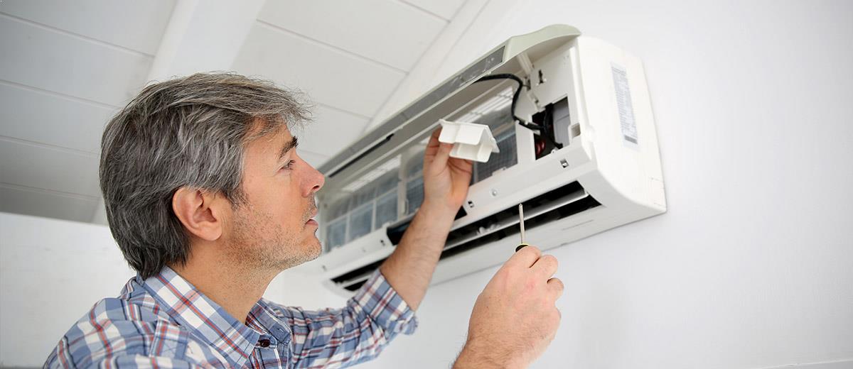 Technician Repairing Air Conditioner — Sewickley, PA — Sta So Cool HVAC