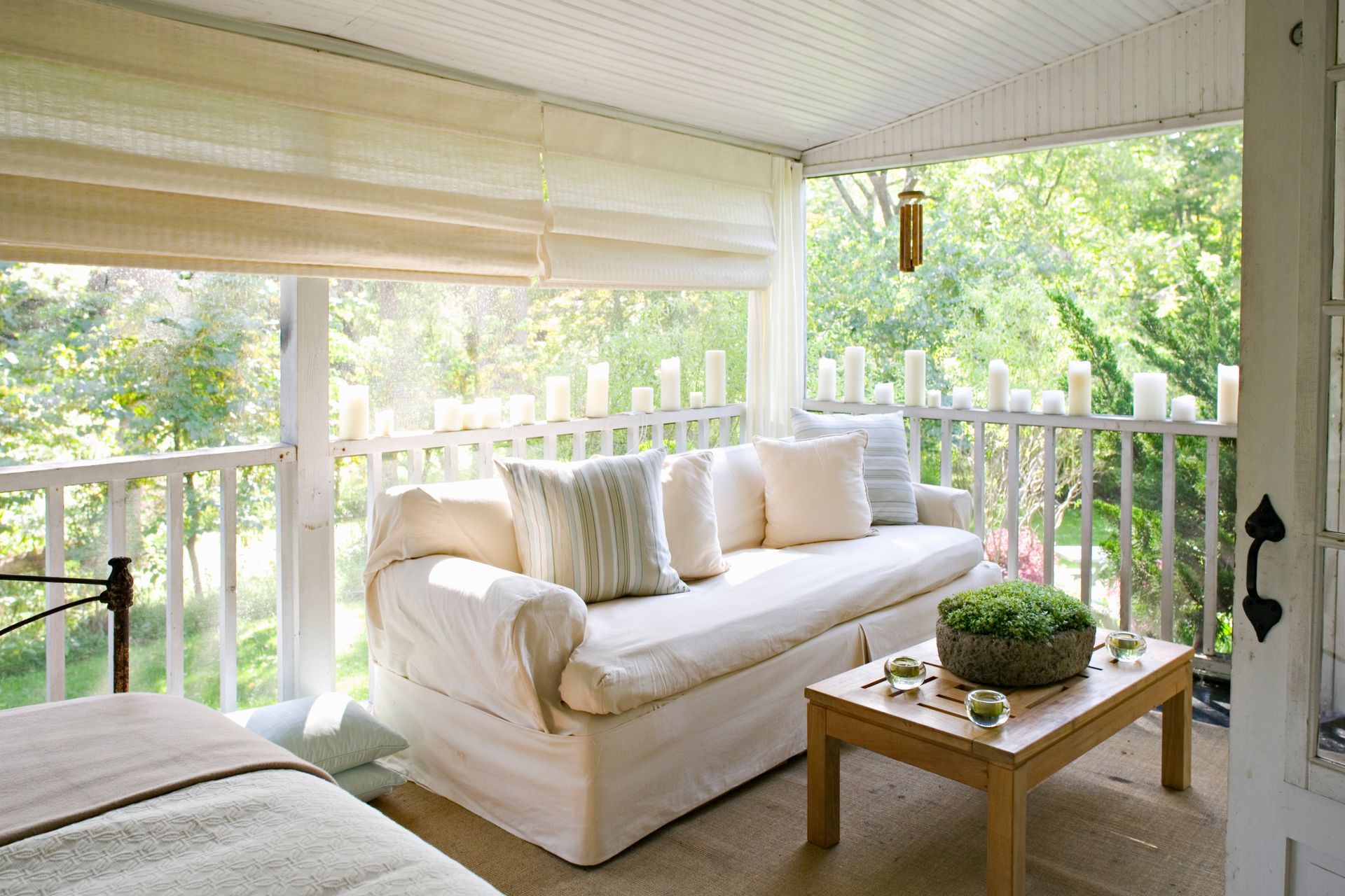 exterior patio shades with a white couch