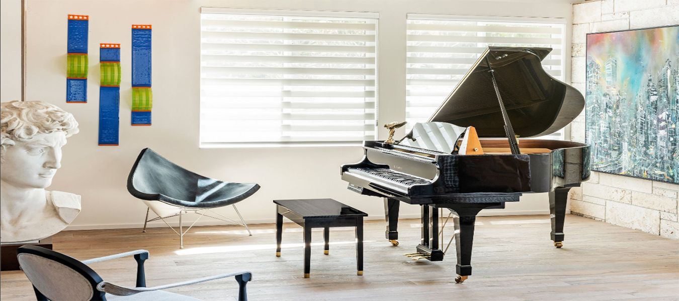 there is a piano in the middle of the room All Window Decor (817) 448-3393.