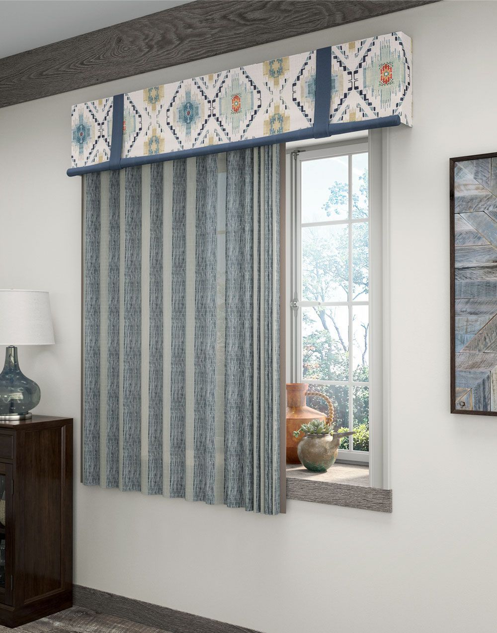 a room with a window and a painting on the wall with curtains that have a cornice above them All Window Decor (817) 448-3393