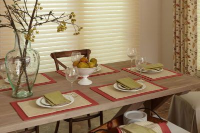a living room with a lot of furniture and shutters on the windows All Window Decor (817) 448-3393