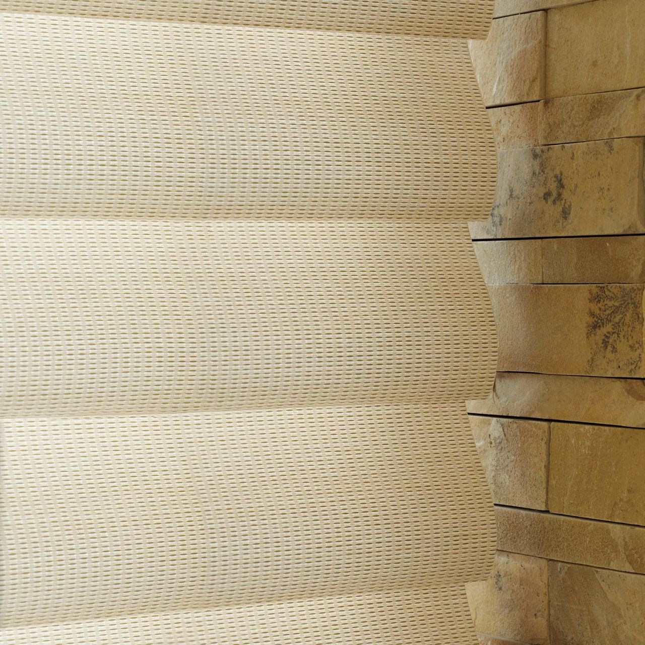 a close up of a roman shade on a wall All Window Decor (817) 448-3393.