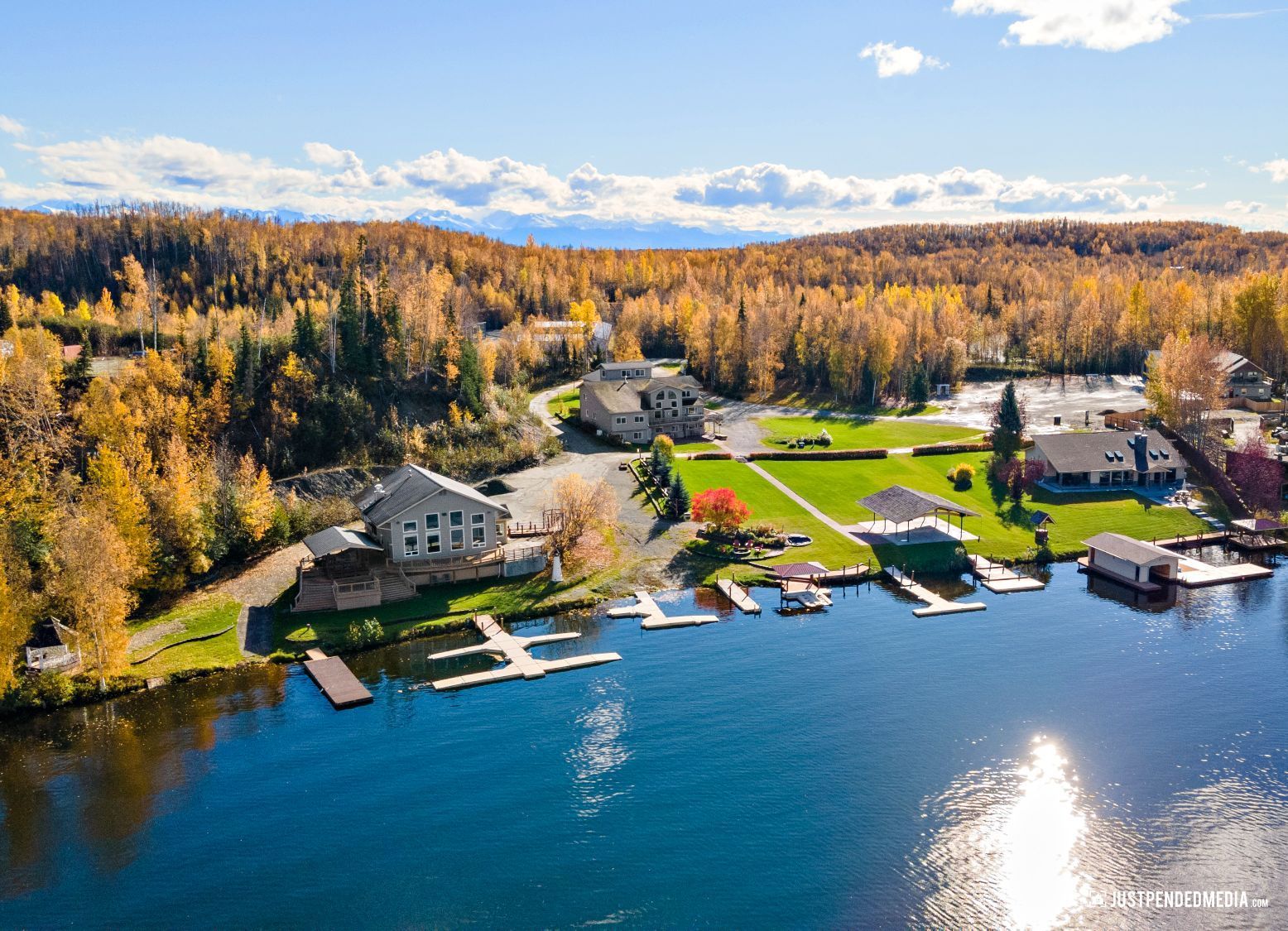 aerial photo of home on lake
