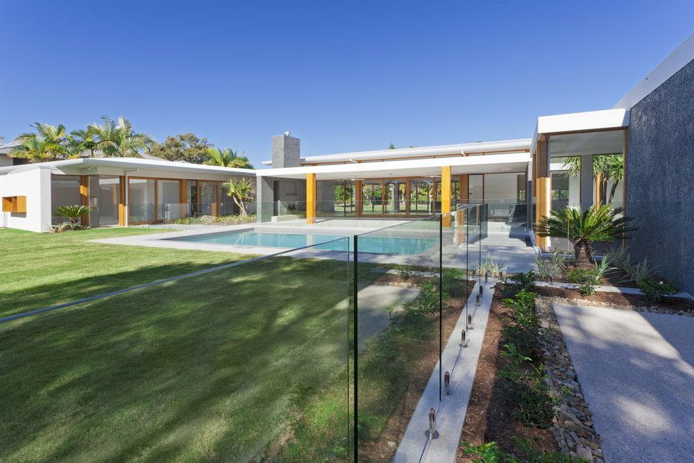 A House With A Pool In The Backyard — Diverse Poolcare–Pool Fence Inspections & Compliance Certificates In Yarrawonga, VIC