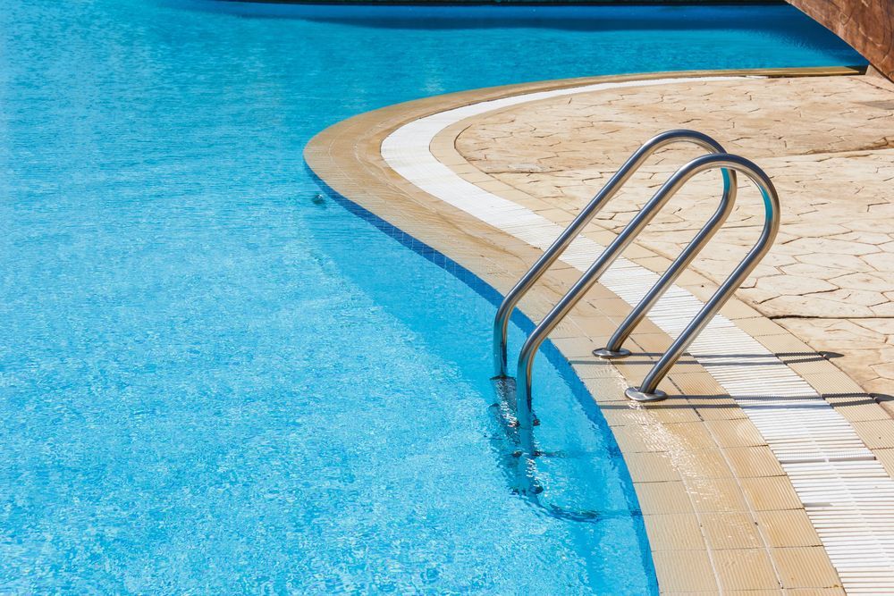 A Close Up Of A Pool With Stairs — Diverse Poolcare–Pool Fence Inspections & Compliance Certificates In West Wodonga, VIC