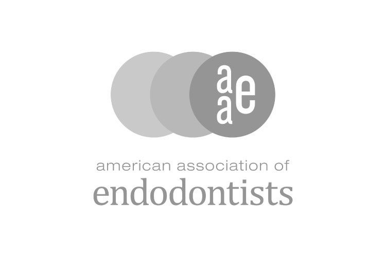 Un logotipo en blanco y negro para la Asociación Americana de Endodoncistas.
