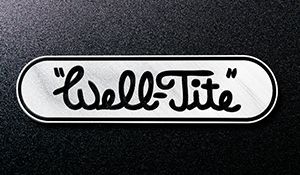 A well-tite logo is on a black surface