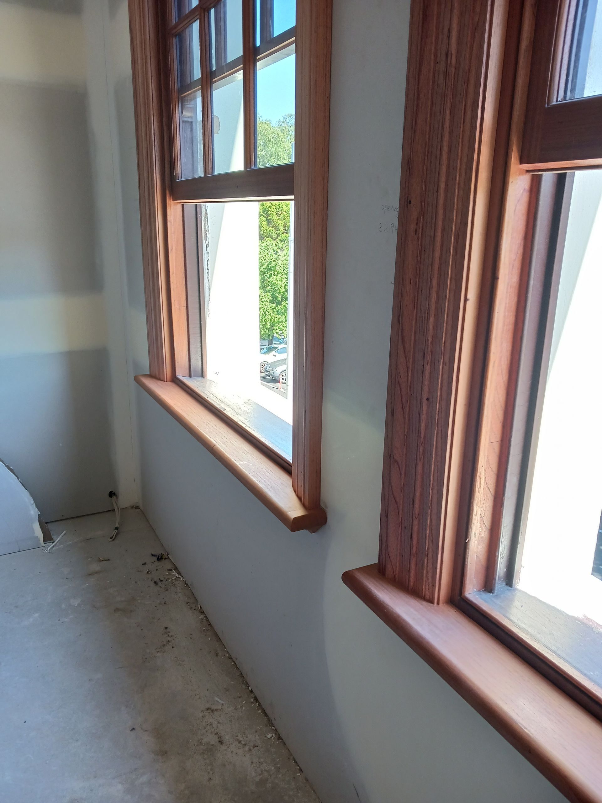 Two Wood-Framed Windows with Light-Coloured Walls and Sills — Lunny's Carpentry In Dubbo, NSW