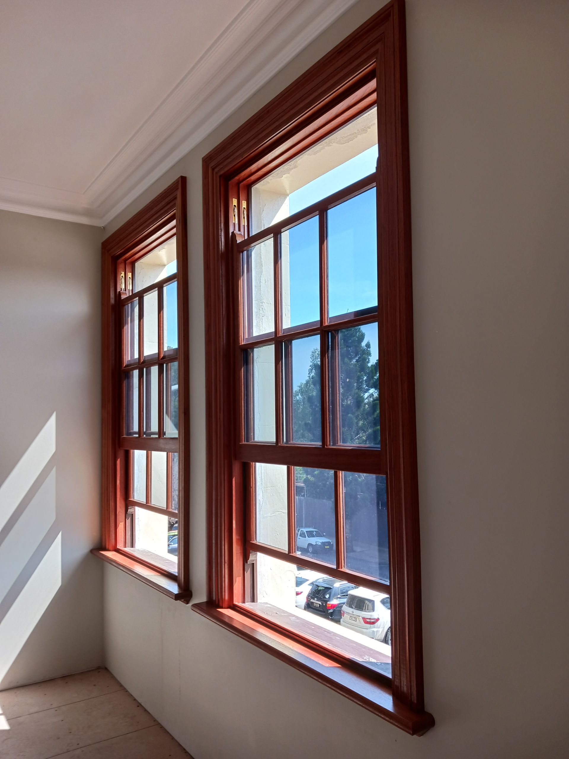 Two Tall, Wooden-Framed Windows with Multiple Panes — Lunny's Carpentry In Mooloolaba, QLD
