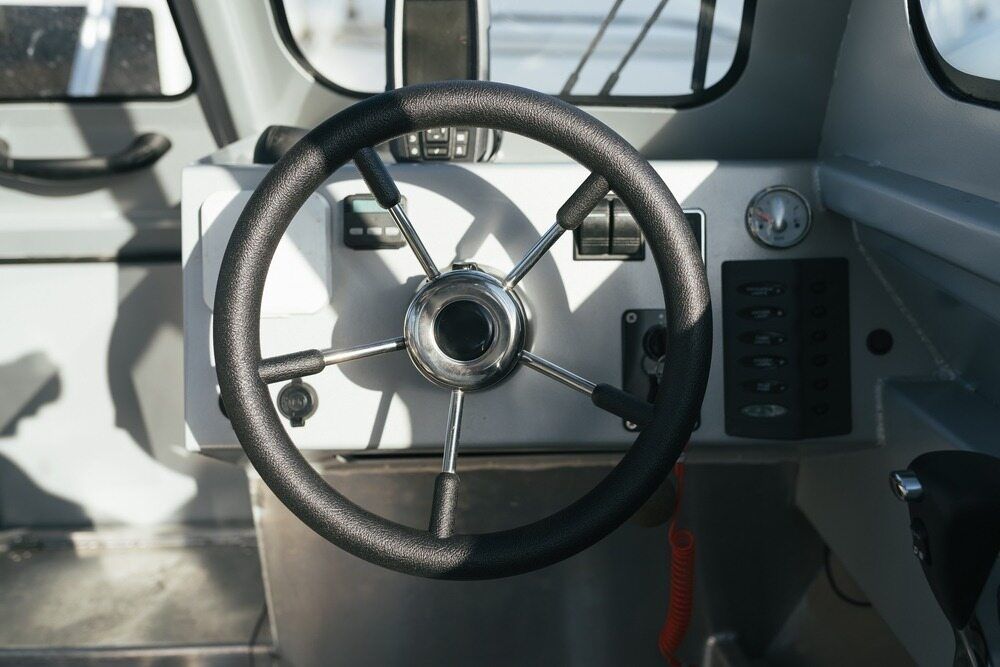 A Close Up Of A Steering Wheel On A Boat — IPOWER Industries In Strathdickie, QLD