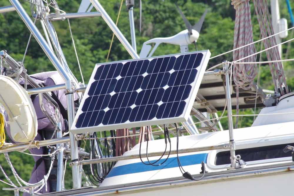 A Solar Panel Is Mounted On The Side Of A Sailboat — IPOWER Industries In Proserpine, QLD