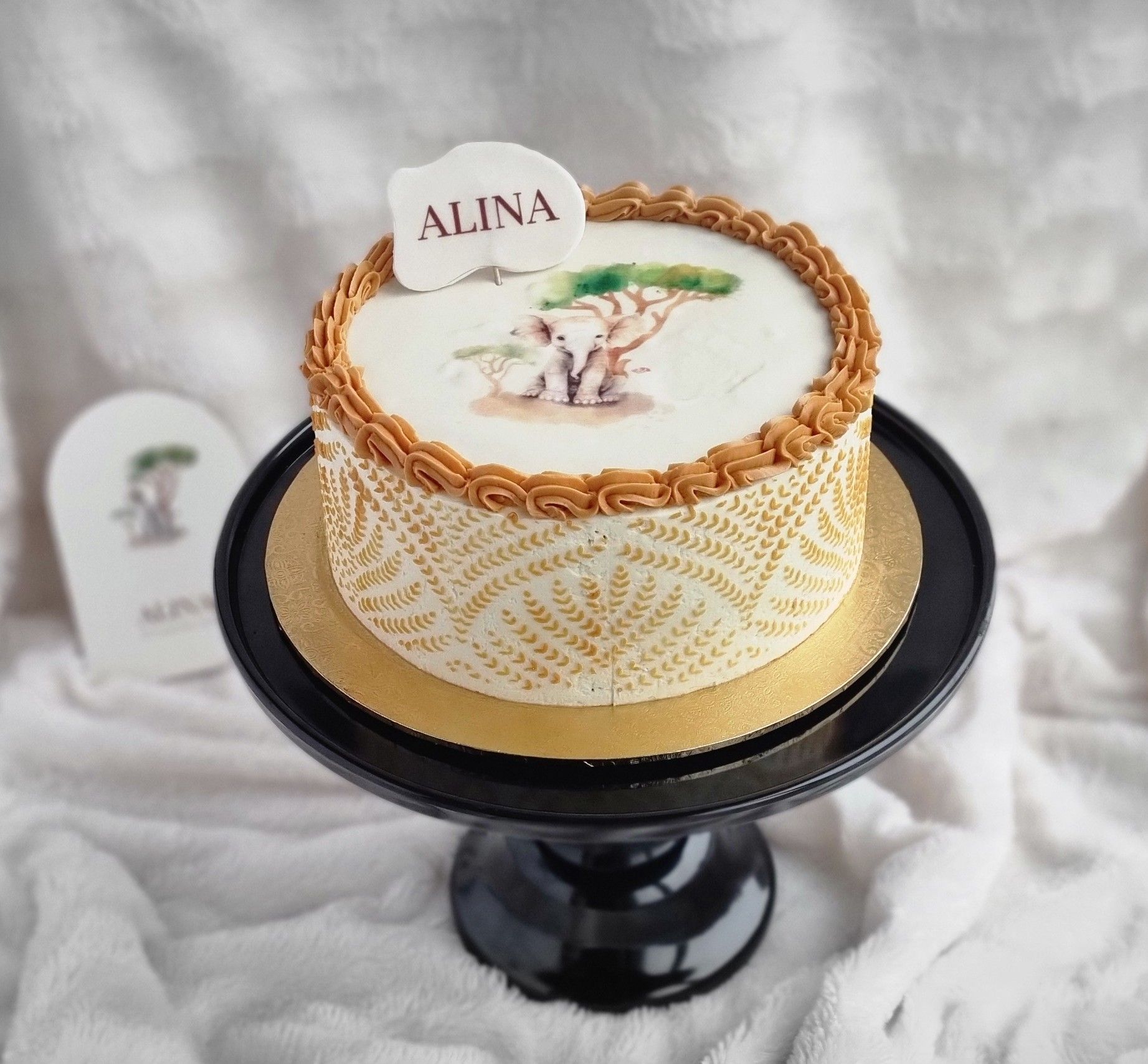 Een taart met de naam erop