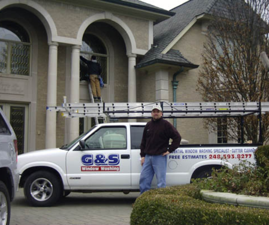 G&S employee in front of commercial vehicle 