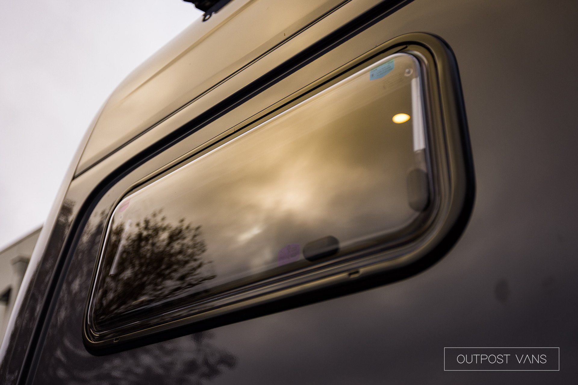 a close up of a window on the side of a van