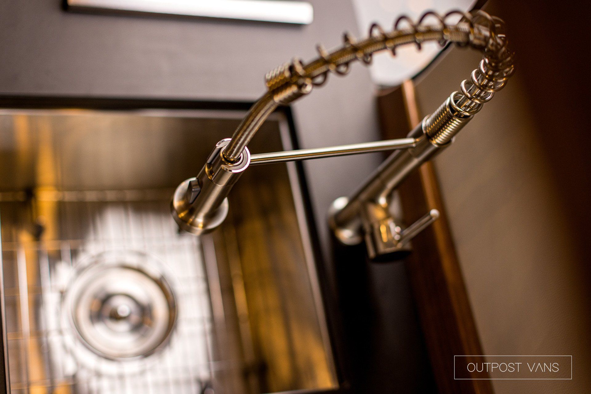 A close up of a faucet in a kitchen
