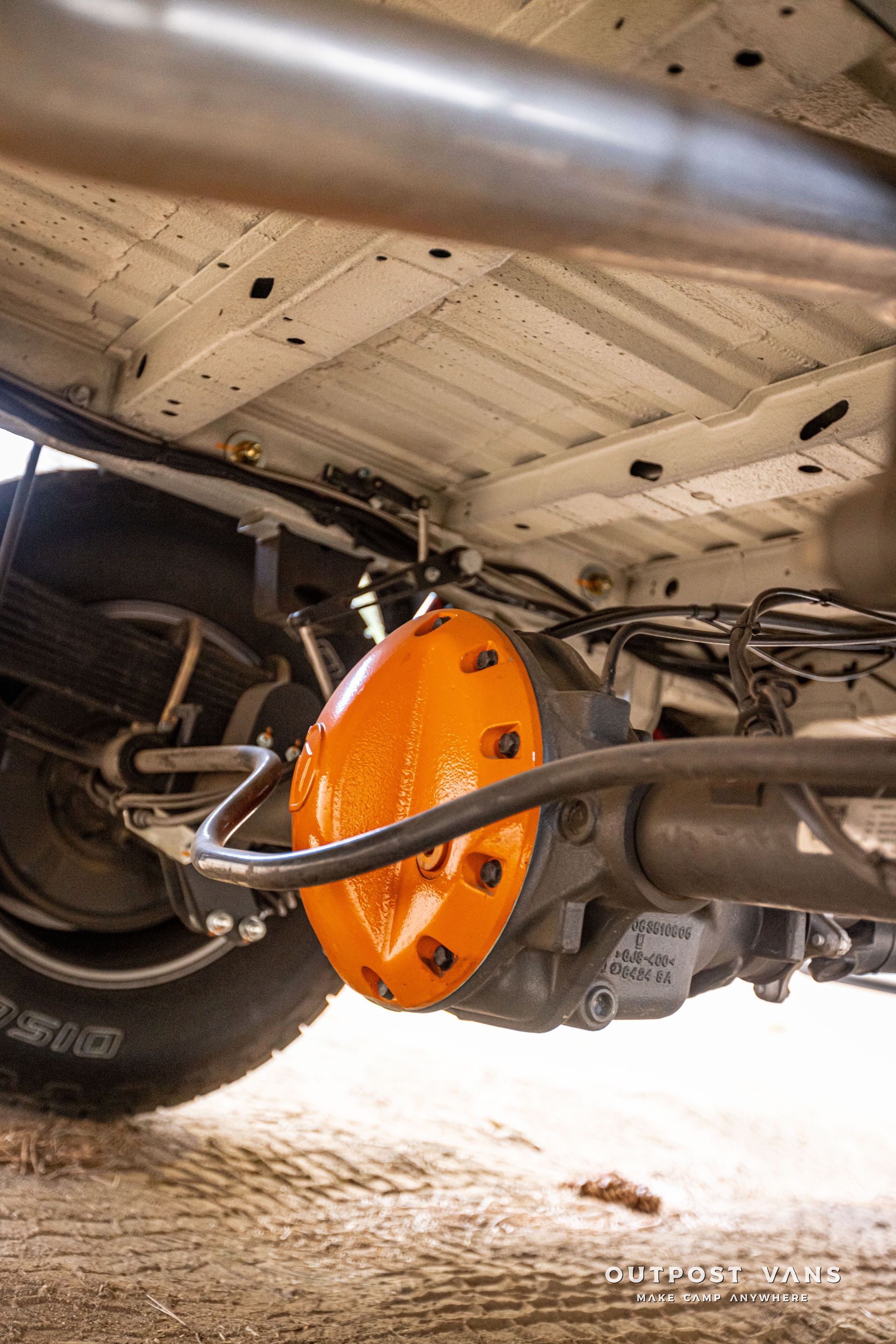 A close up of the rear axle of a truck.