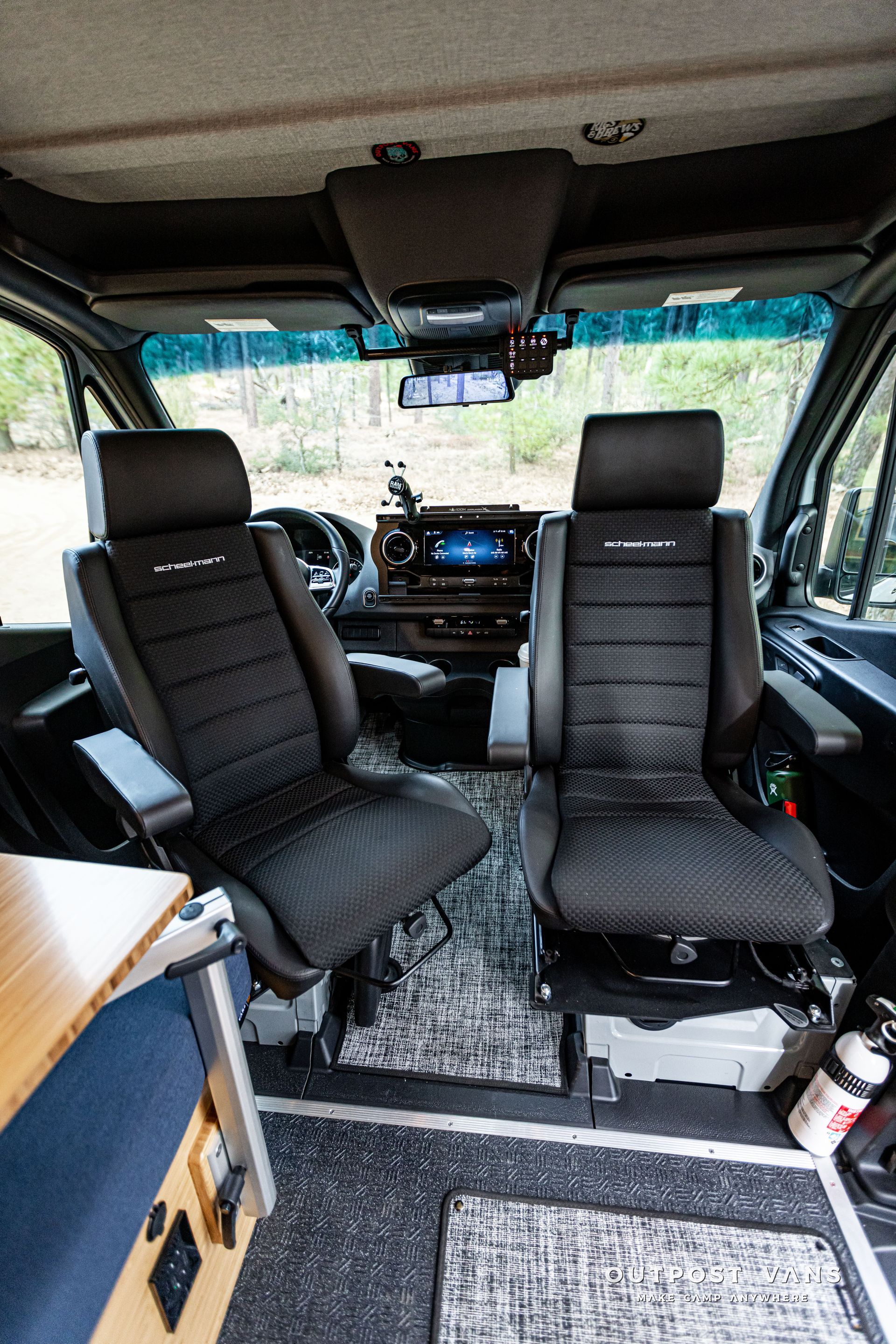 There are two seats in the back of a van.