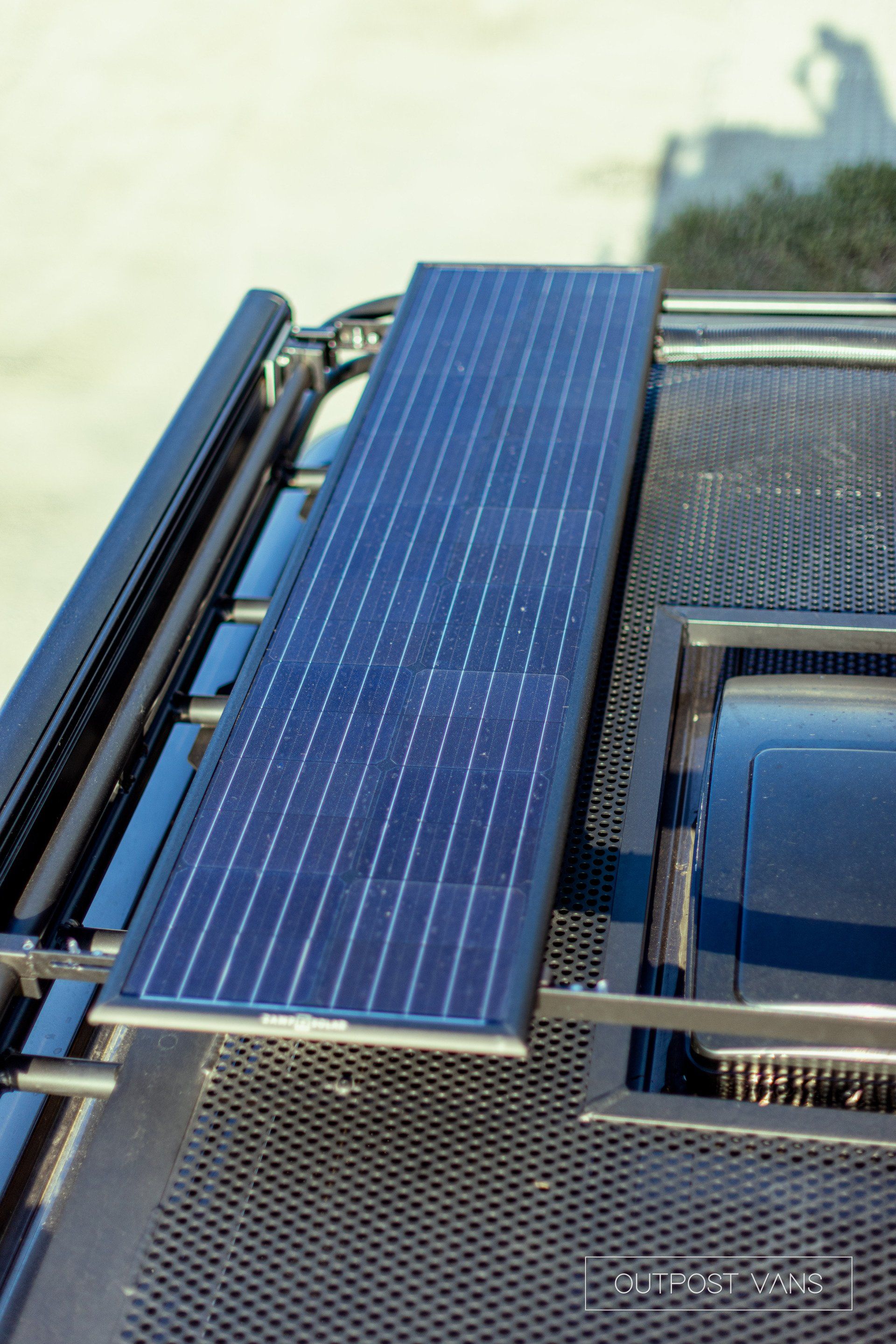 a solar panel is attached to the roof of a vehicle