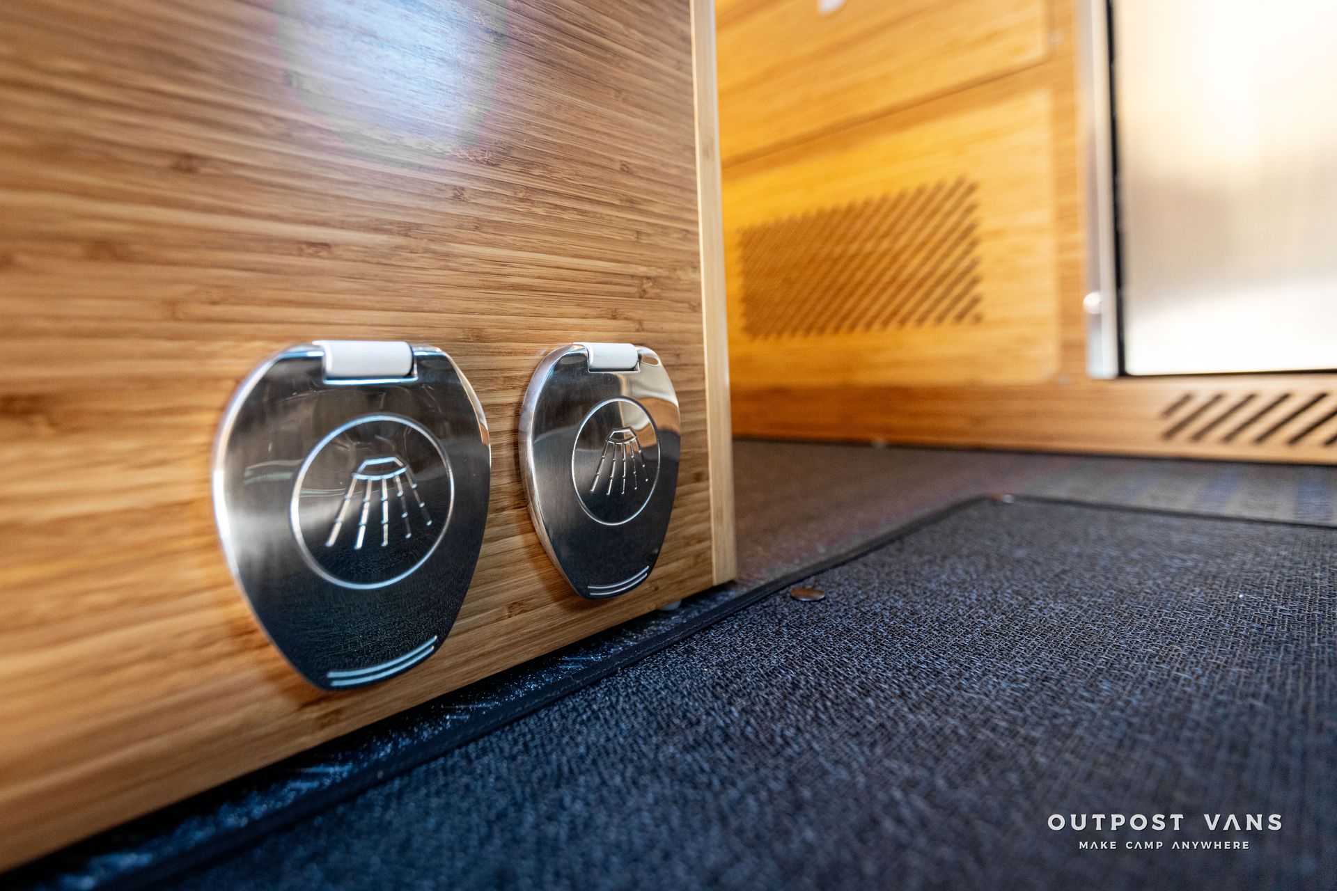 Outpost vans in the floor shower pan with bamboo insert shower hose and mixer. custom shower curtain