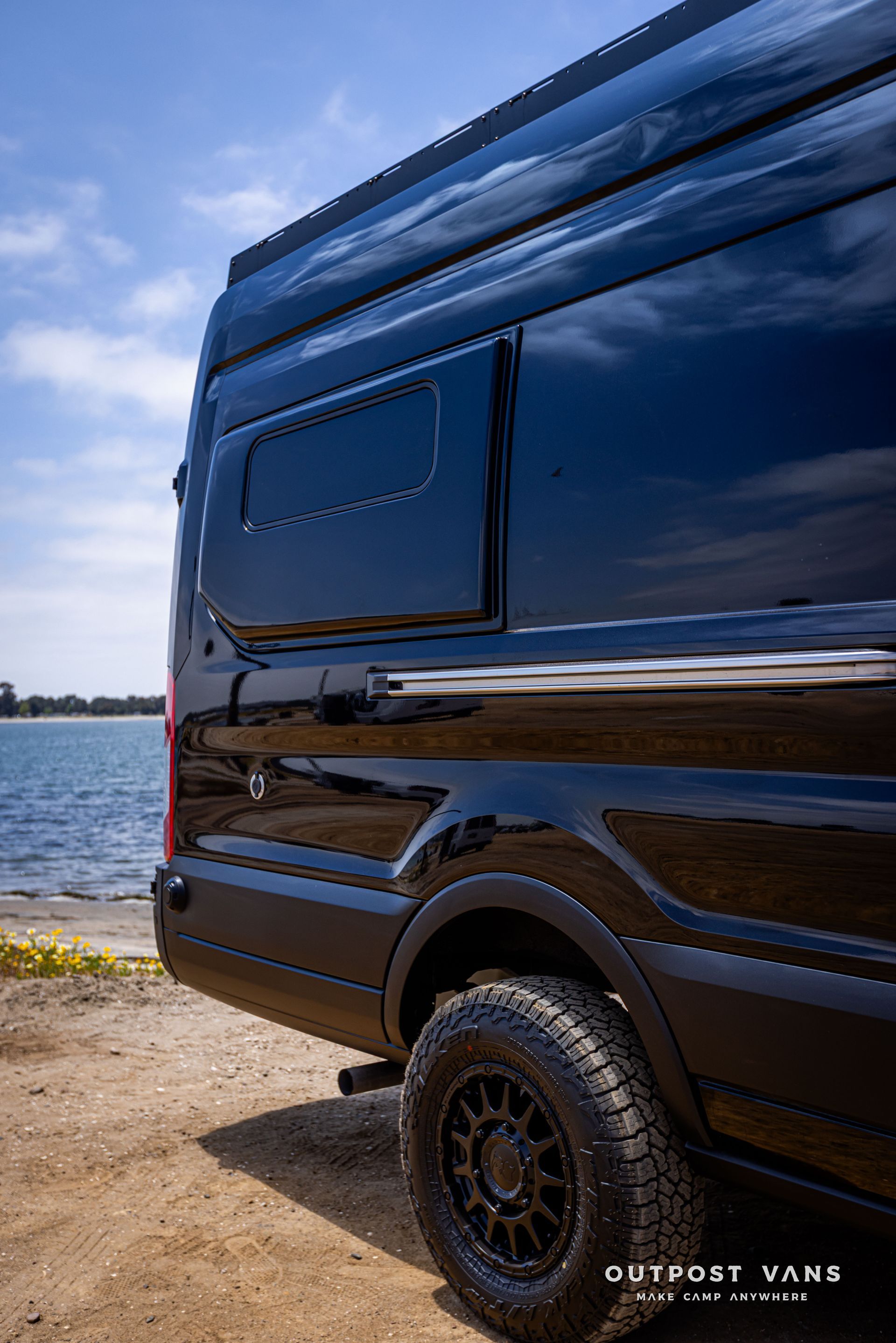 Outpost Vans custom built camper van Ford Transit 148 AWD