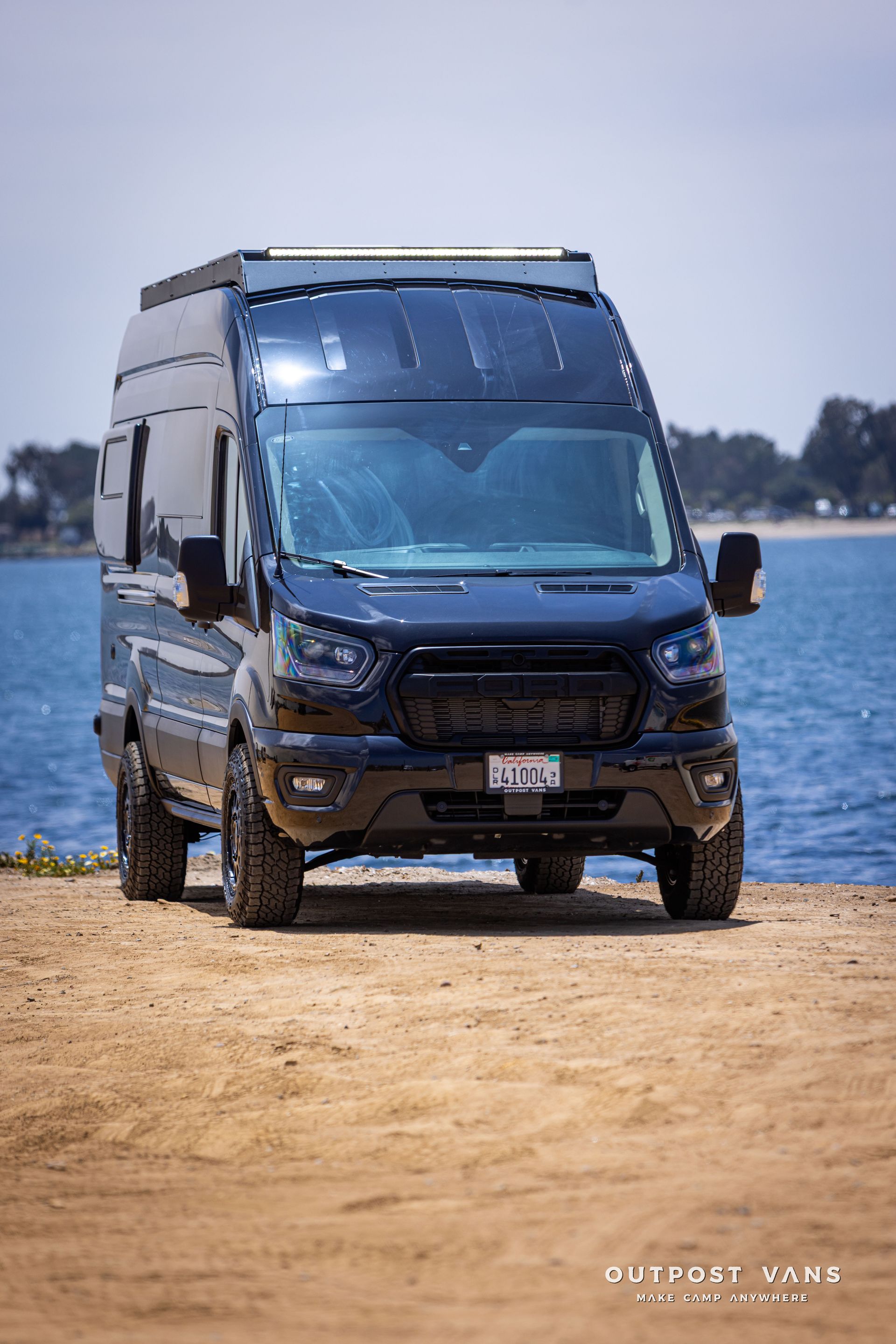 Outpost Vans custom built camper van Ford Transit 148 AWD