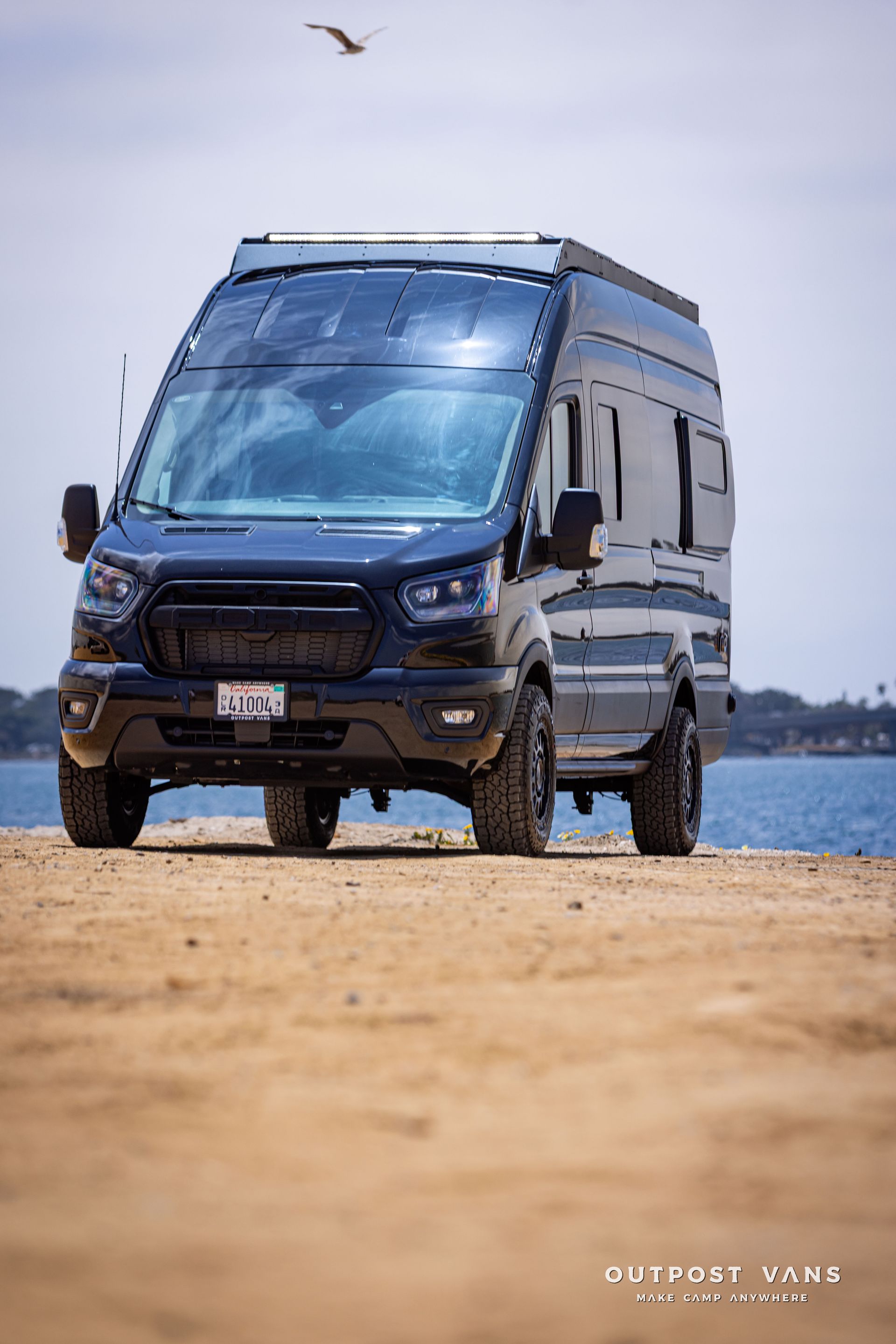 Outpost Vans custom built camper van Ford Transit 148 AWD