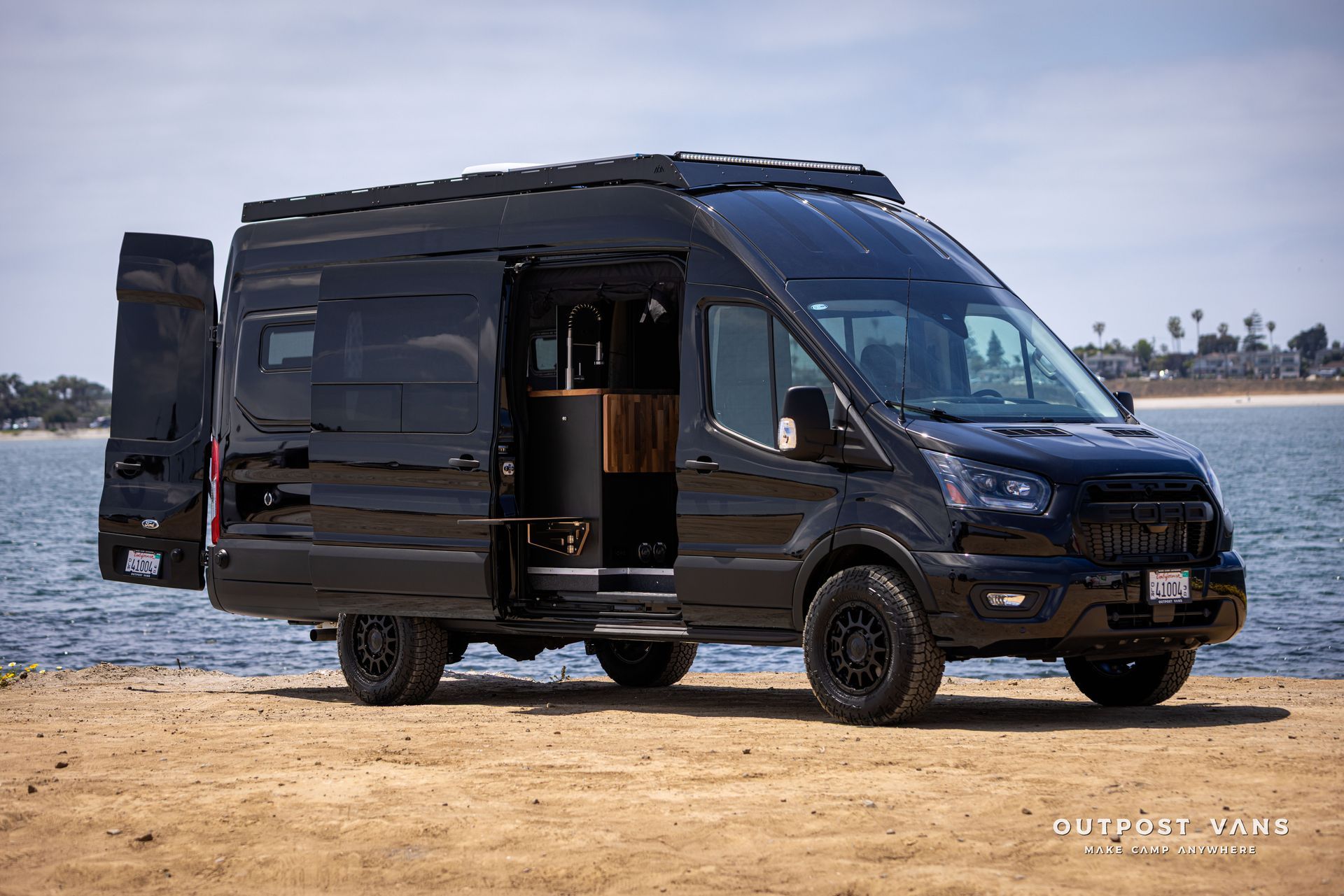 Outpost Vans custom built camper van Ford Transit 148 AWD