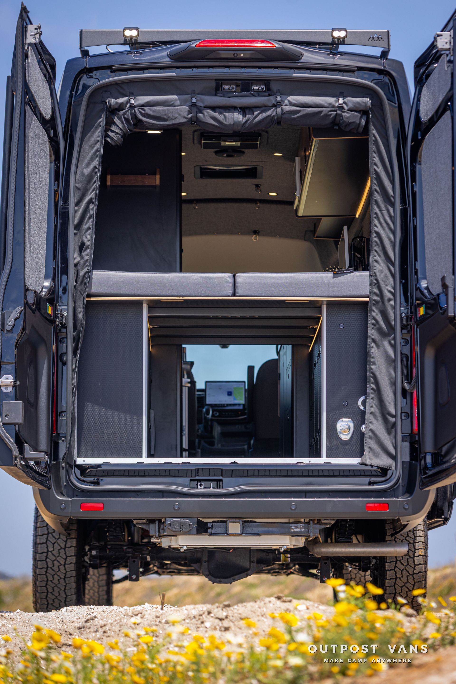 Outpost Vans custom built camper van Ford Transit 148 AWD