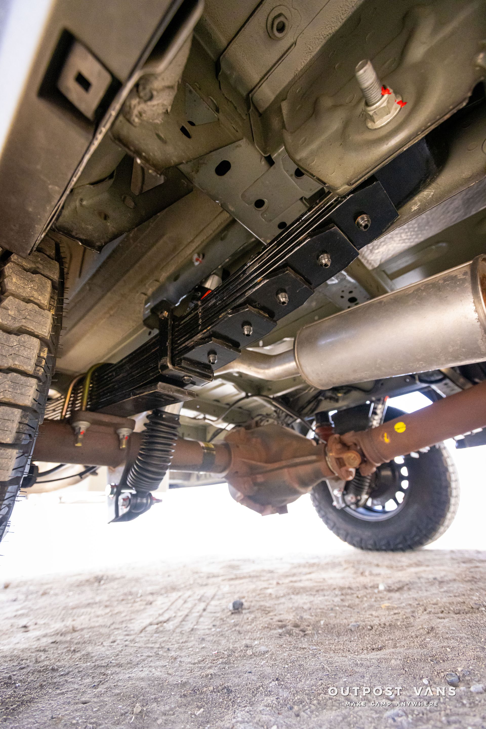 Outpost Vans custom built camper van Ford Transit 148 AWD. Upgraded suspesion leafs with fox struts