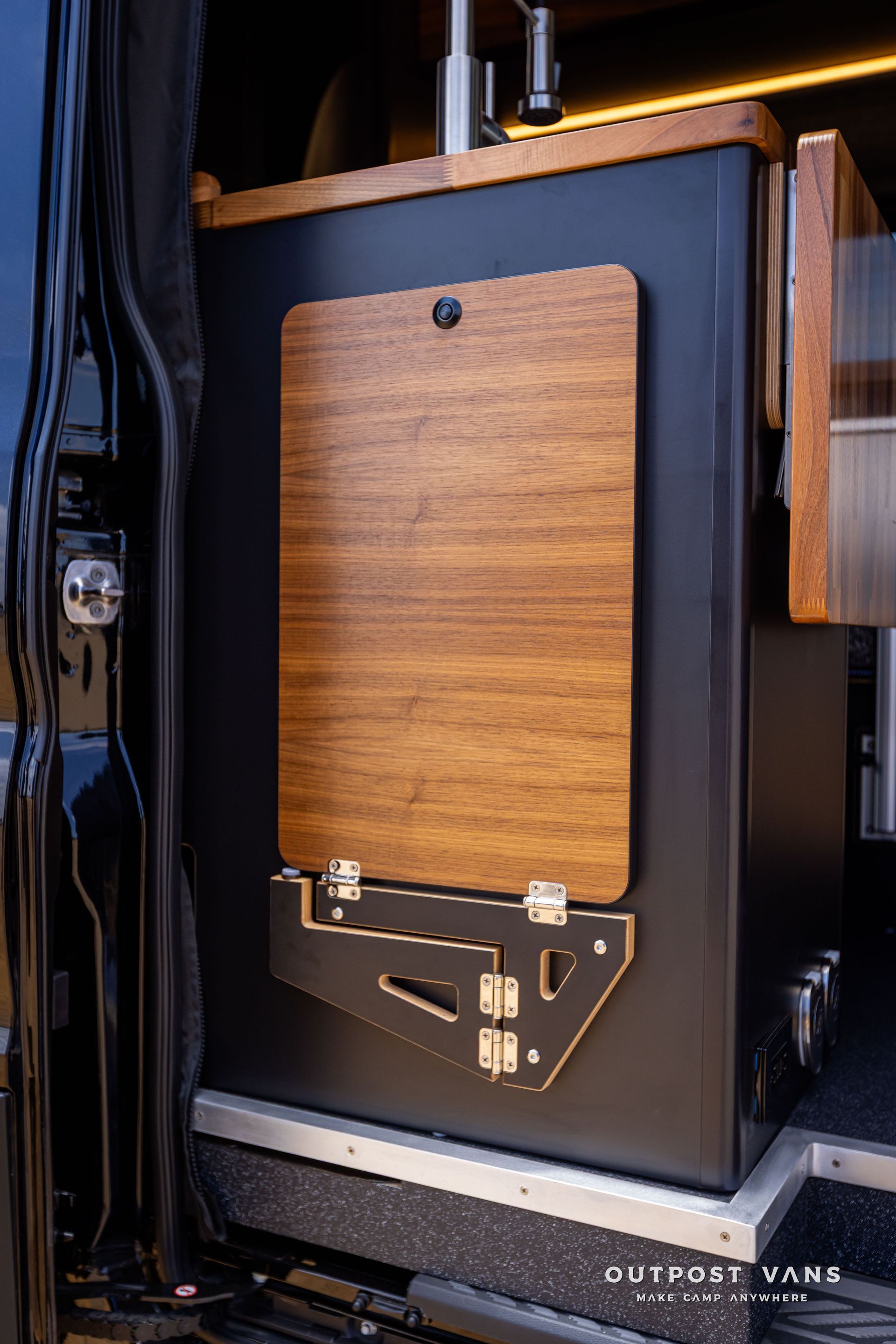 Outpost Vans custom built camper van Ford Transit 148 AWD.